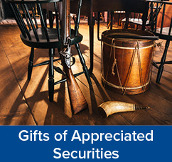 A gun, a powder horn, and a drum. Gifts of Appreciated Securities Rollover